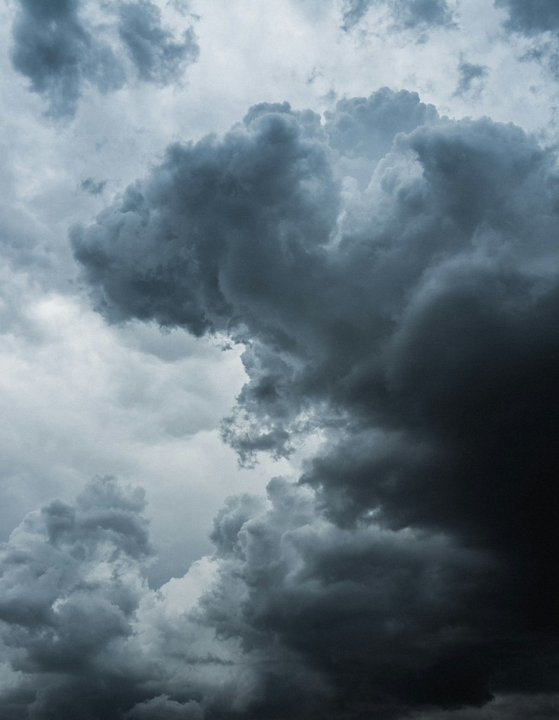 Dark blue storm clouds background for Smooth Discord music bot hero